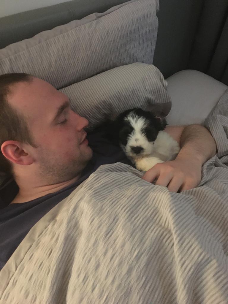 Evan with his puppy.