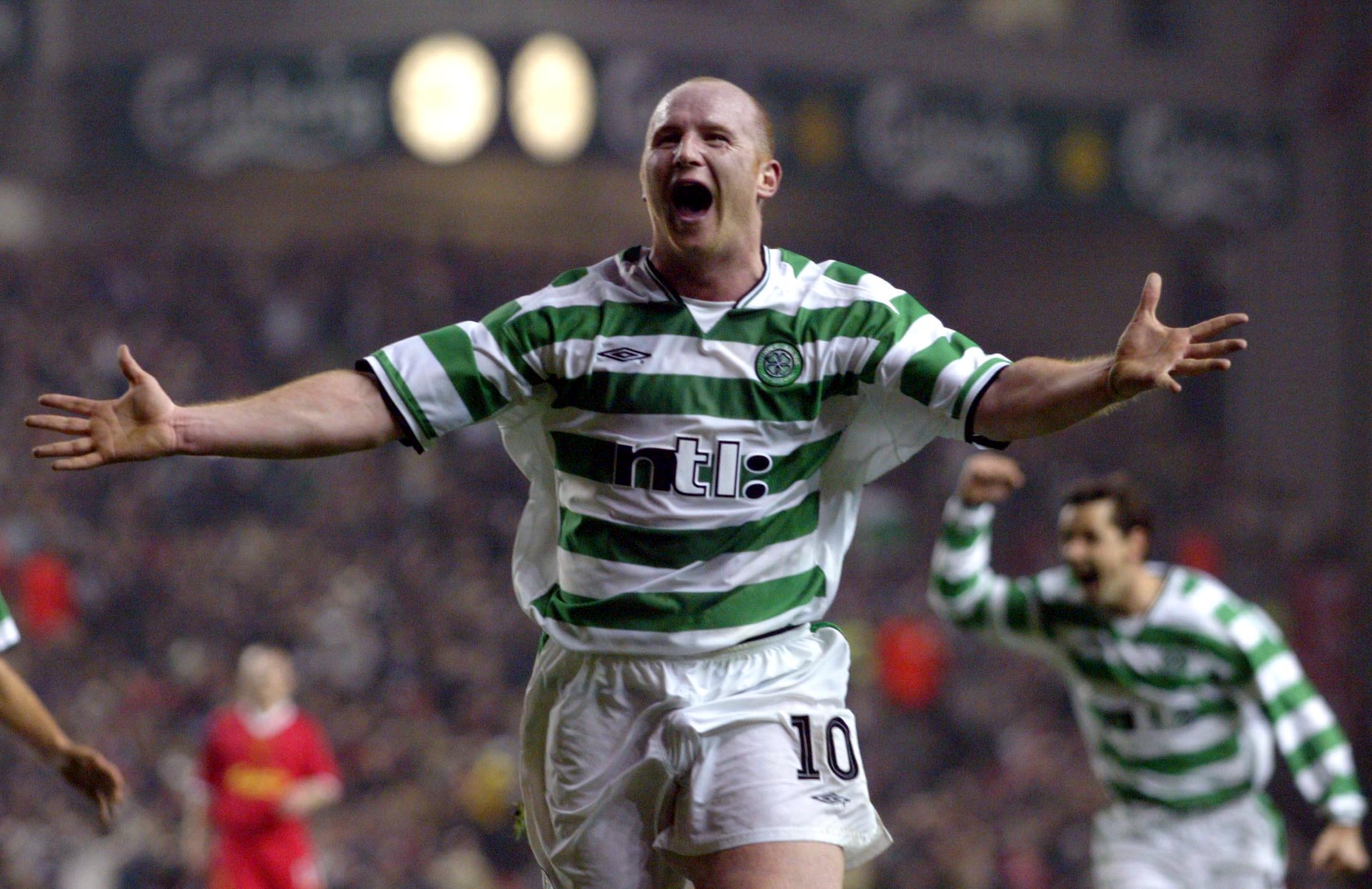 Anfield: Hartson celebrates goal in 2-0 win over Liverpool. 