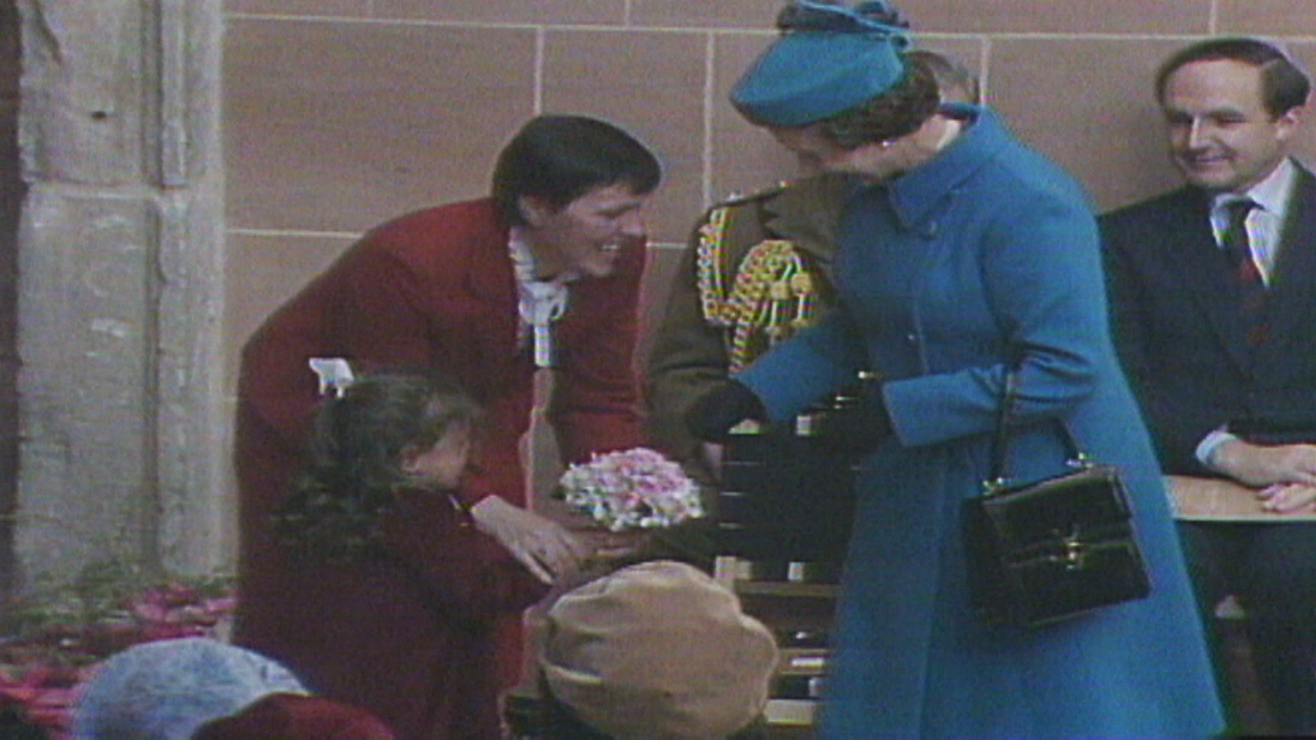 A schoolgirl was chosen to present the Queen with flowers and ended up making headlines when she burst into tears.