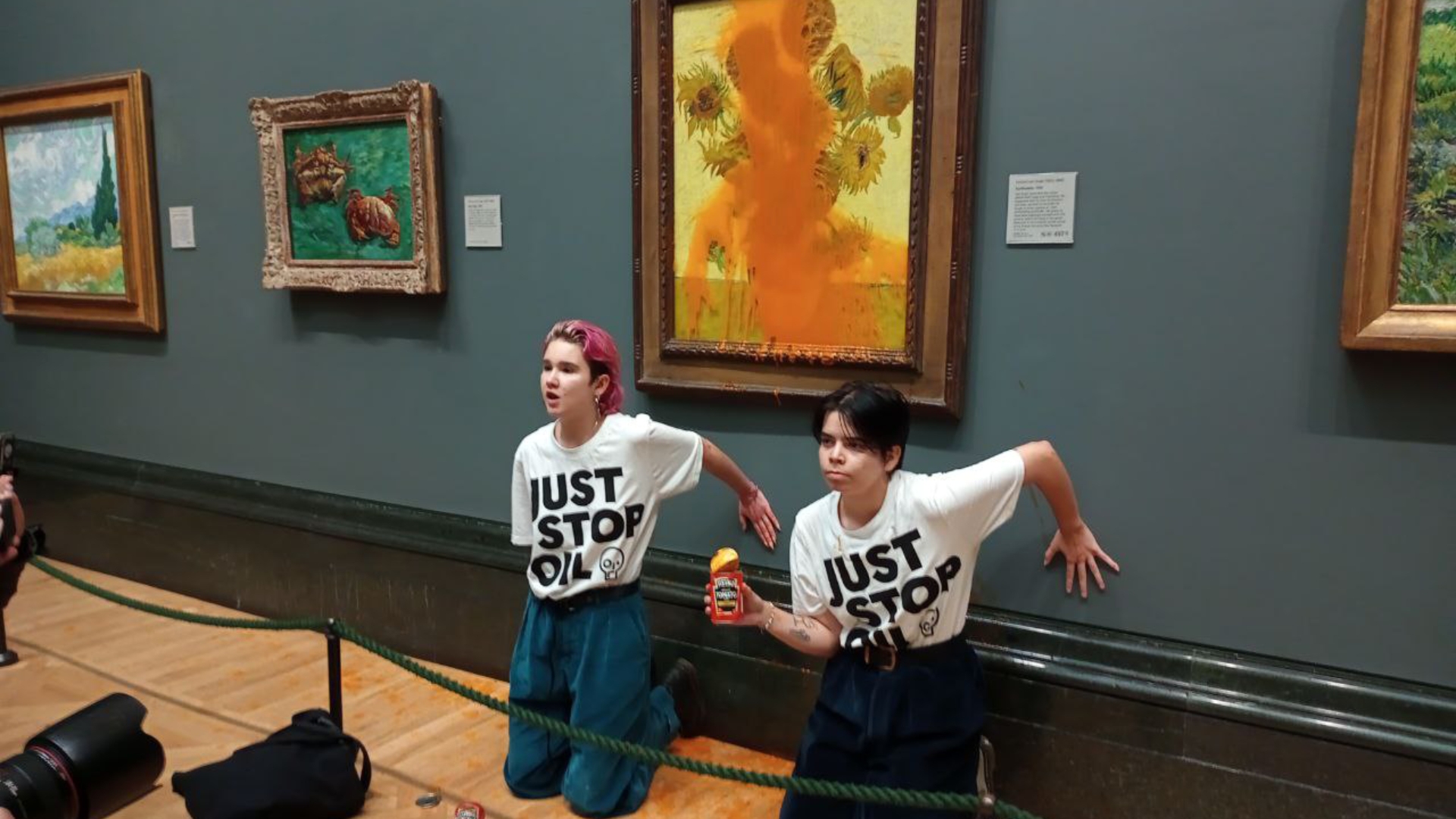 The two women, dressed in Just Stop Oil t-shirts then glued their hands to the space beneath the painting.