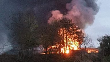 Fire crews called to farm in Angus after barn holding hay bales and equipment goes up in flames