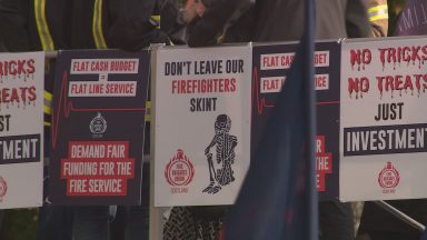 Firefighters protest outside Holyrood over pay dispute