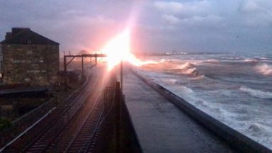 Trains cancelled as waves and sea spray crash into overhead wires in North Ayrshire