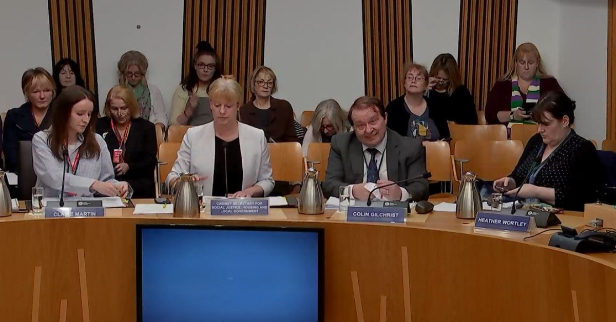 Apology after woman asked to leave Scottish Parliament committee over scarf in suffrage colours