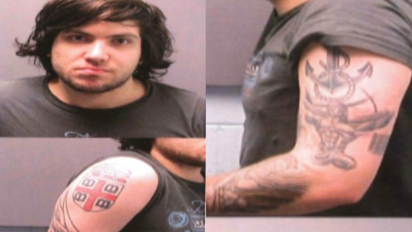 Distinctive tattoos on the arms of Nicholas Rossi.