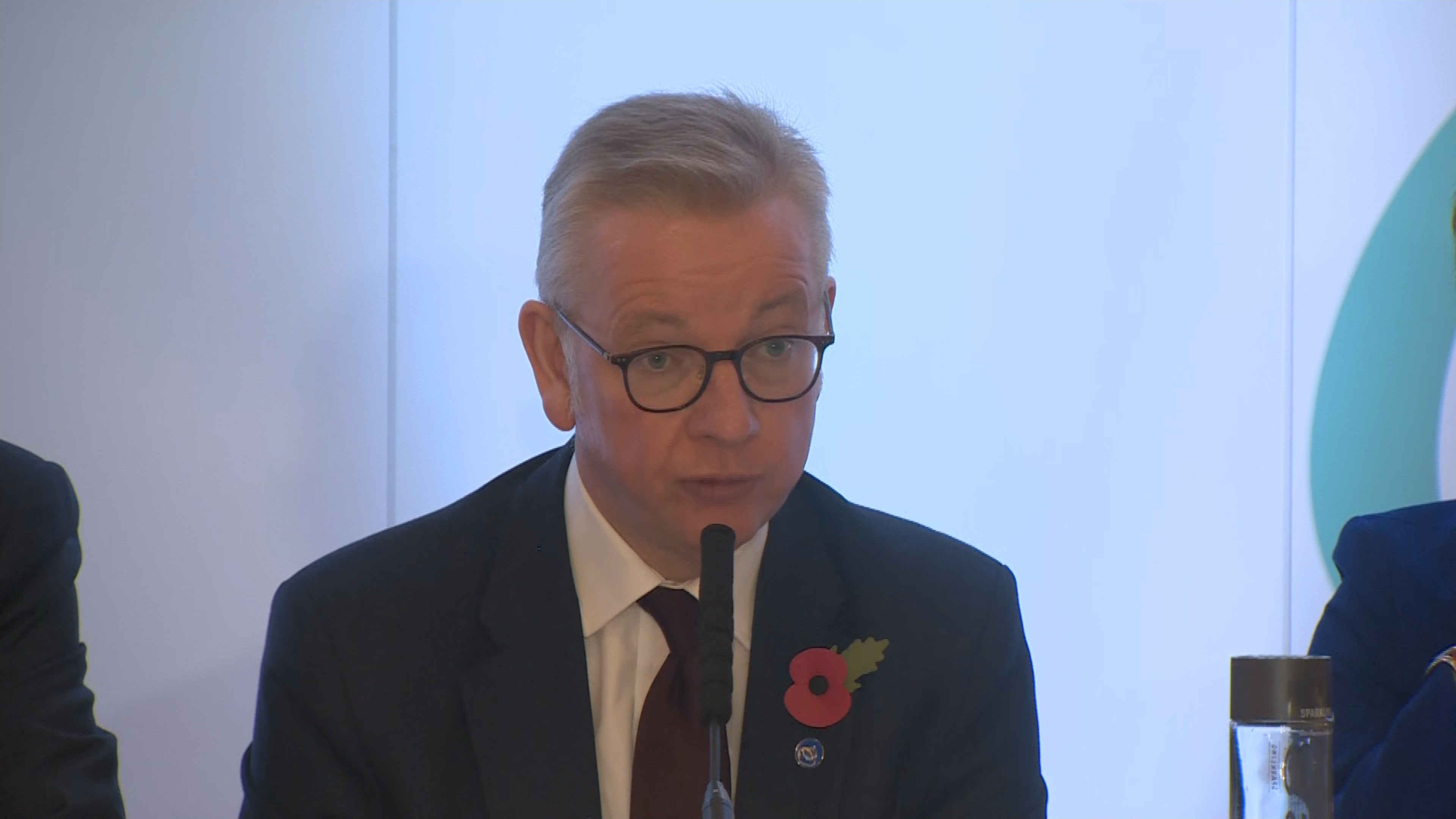 Michael Gove sat next to Nicola Sturgeon at the press conference. 