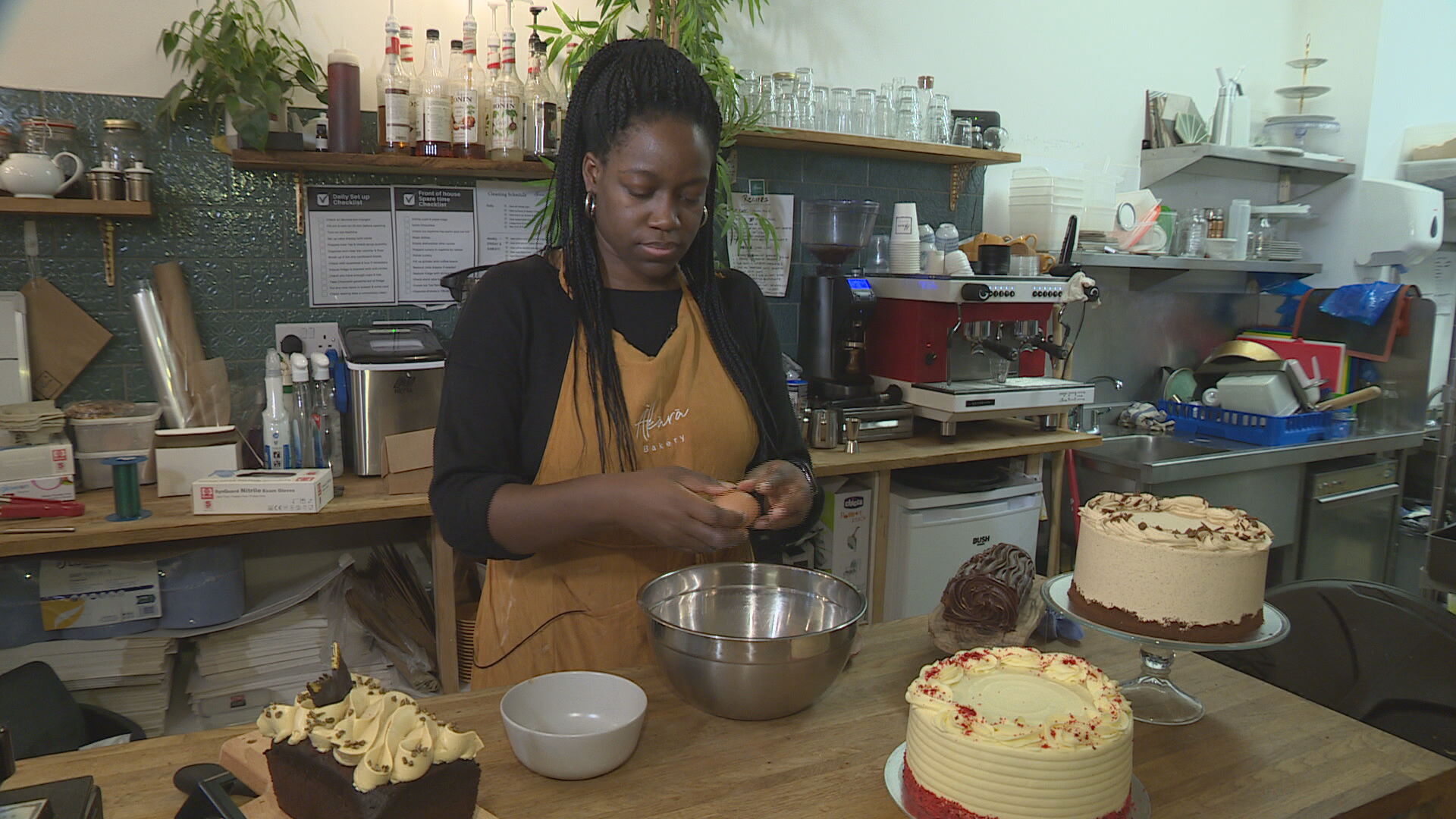 Lewa Thomas baking at her café in Dennistoun.