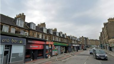 Man rushed to hospital and another injured after fire breaks out at building on Dalry Road in Edinburgh