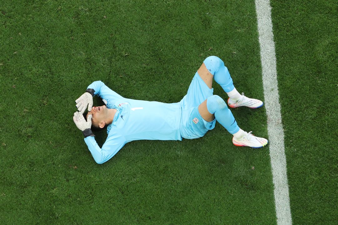 England v Iran: Goalkeeper Alireza Beiranvand stays on after serious collision and head injury