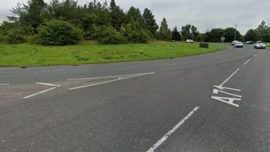 Driver dies on A71 Moorfield roundabout near Kilmarnock after car collides with lorry on layby