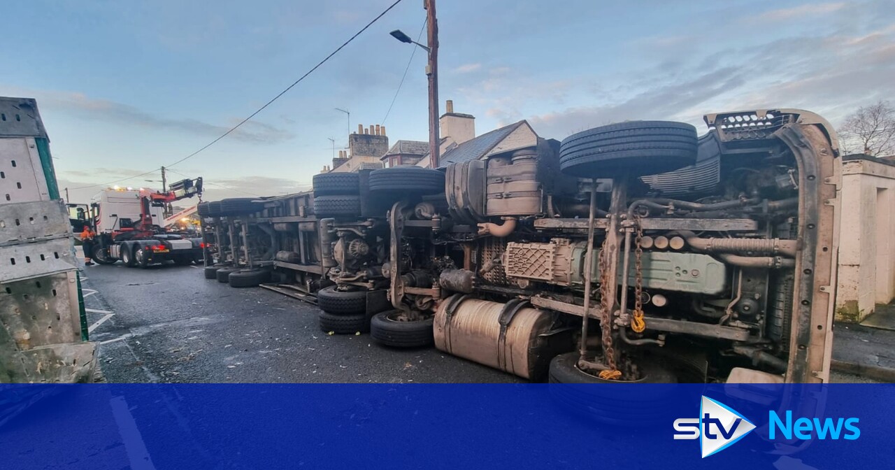 Man in hospital after crash between two lorries and three cars in