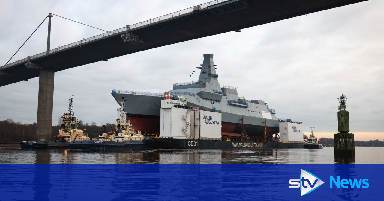 Royal Navy's new HMS Glasgow takes to water down River Clyde for first
