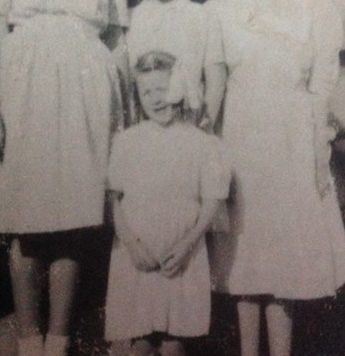 Irene Gresty outside the home she and Janet grew up in as neighbours in 1946. 