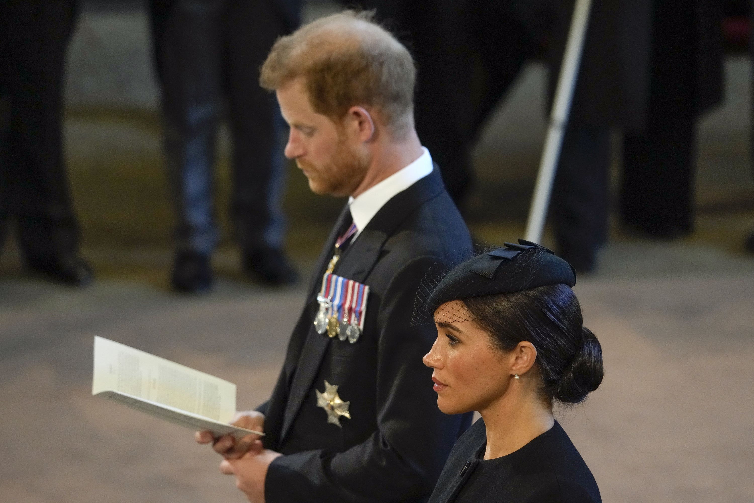 The Duke and Duchess of Sussex during a service in Westminster Hall for the Queen.