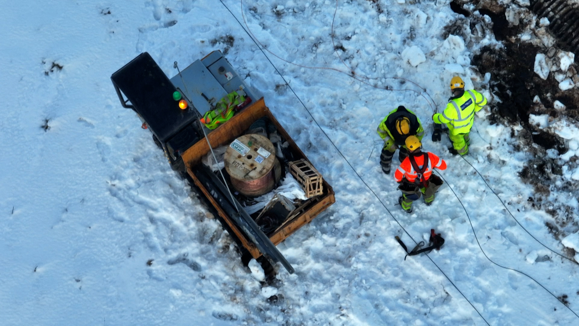 Engineers work to repair downed power lines in Shetland that have seen thousands without electricity for days.