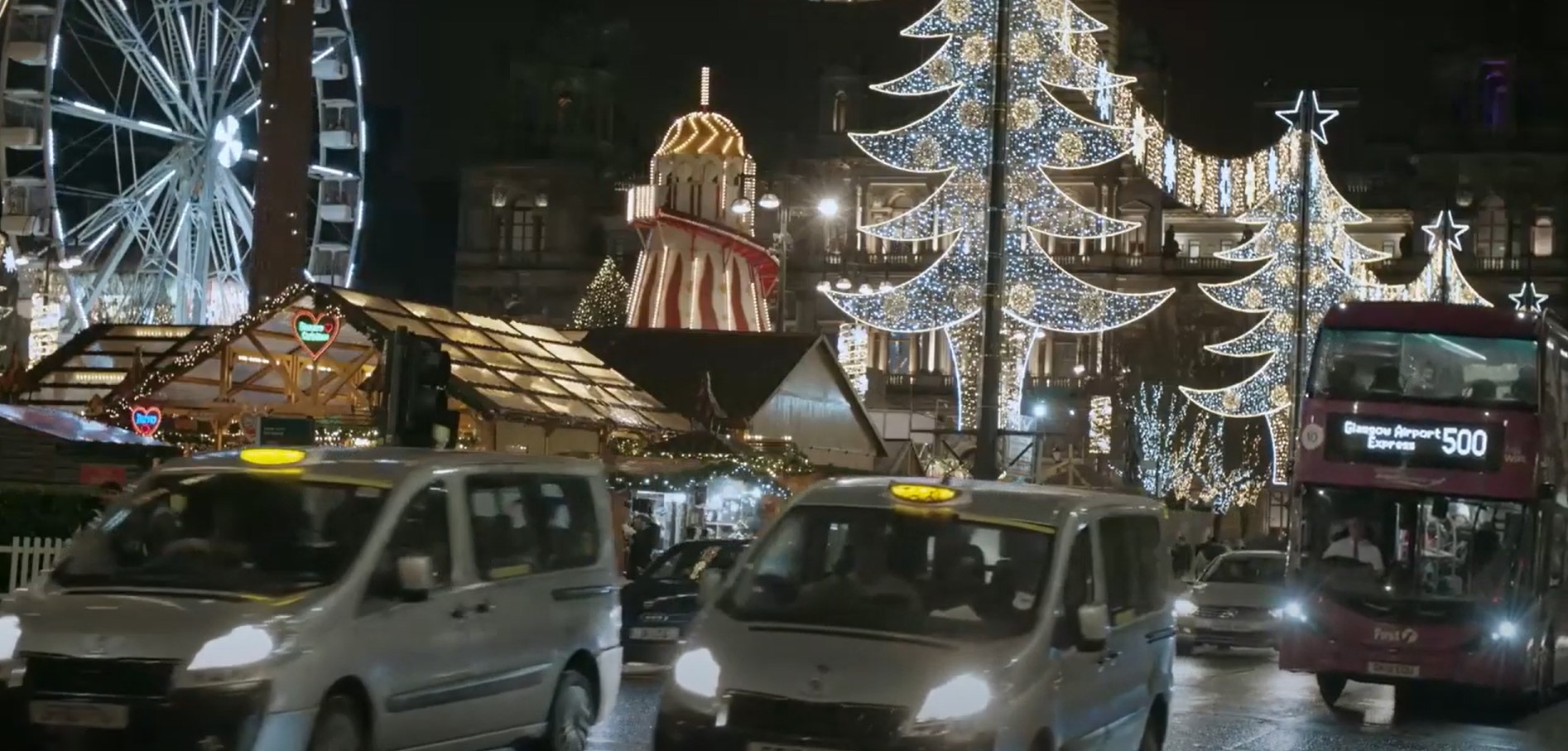 Another shot of 'London' reveals George Square's classic decorations – alongside a bus heading to Glasgow Airport.