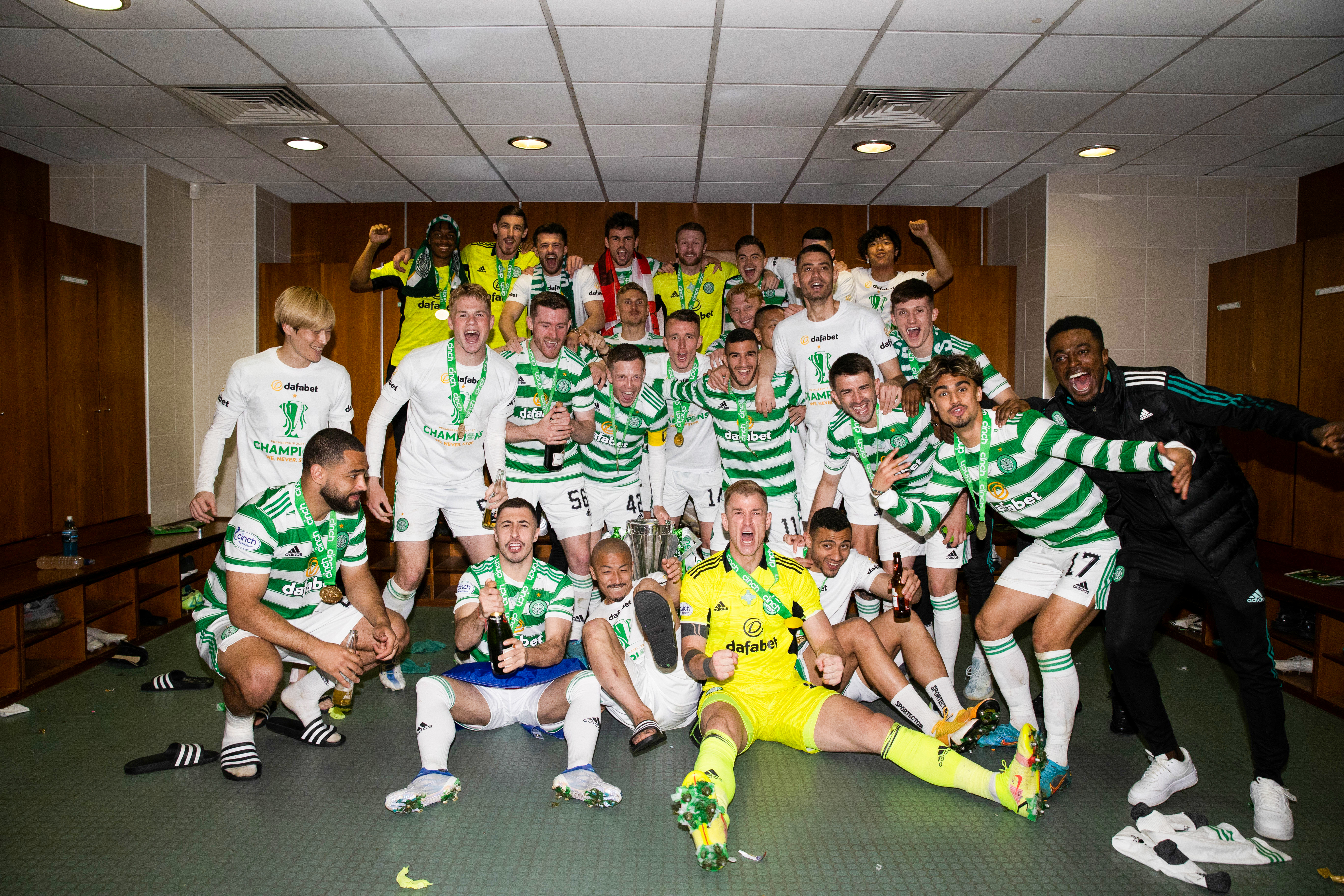 Celtic players celebrate with the Premiership Trophy. (Photo by Craig Williamson / SNS Group)