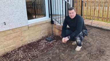 Midlothian family returns from holiday to find garden flooded with sewage