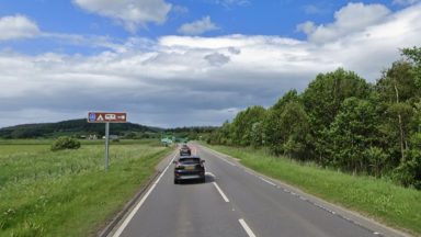 Carriageway blocked after vehicle bursts into flames in Huntly, Aberdeenshire