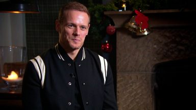 Outlander star Sam Heughan reveals Christmas favourites are Bad Santa, The Grinch and Groundhog Day