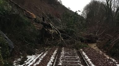 Ben Cruachan landslip causes 100 tonnes of debris to block Oban railway line and A85 road