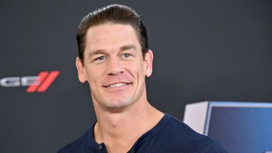 Why has WWE and Fast and Furious star John Cena started following dozens of Scottish journalists?