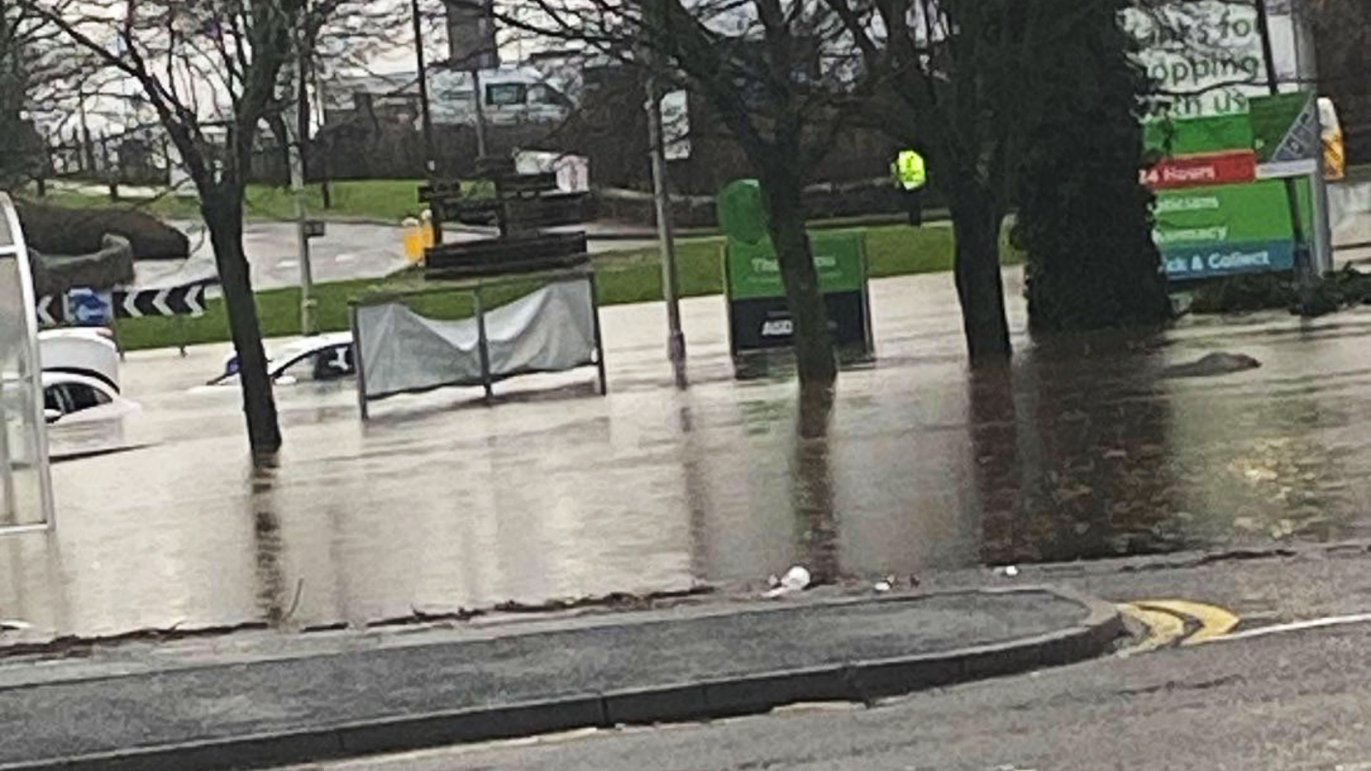 Cars submerged in water at Halbeath Retail Park in Dunfermline.