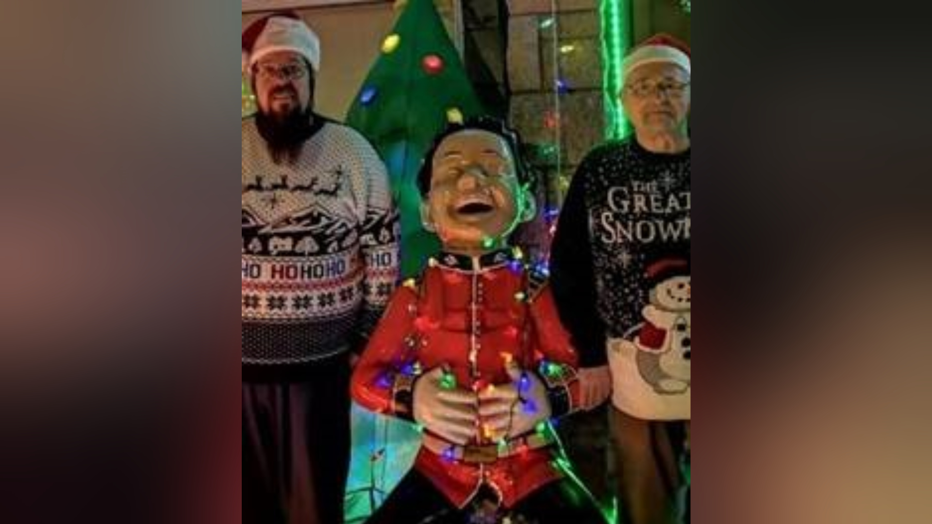 Ian and Syd Craighead outside their lit-up home.