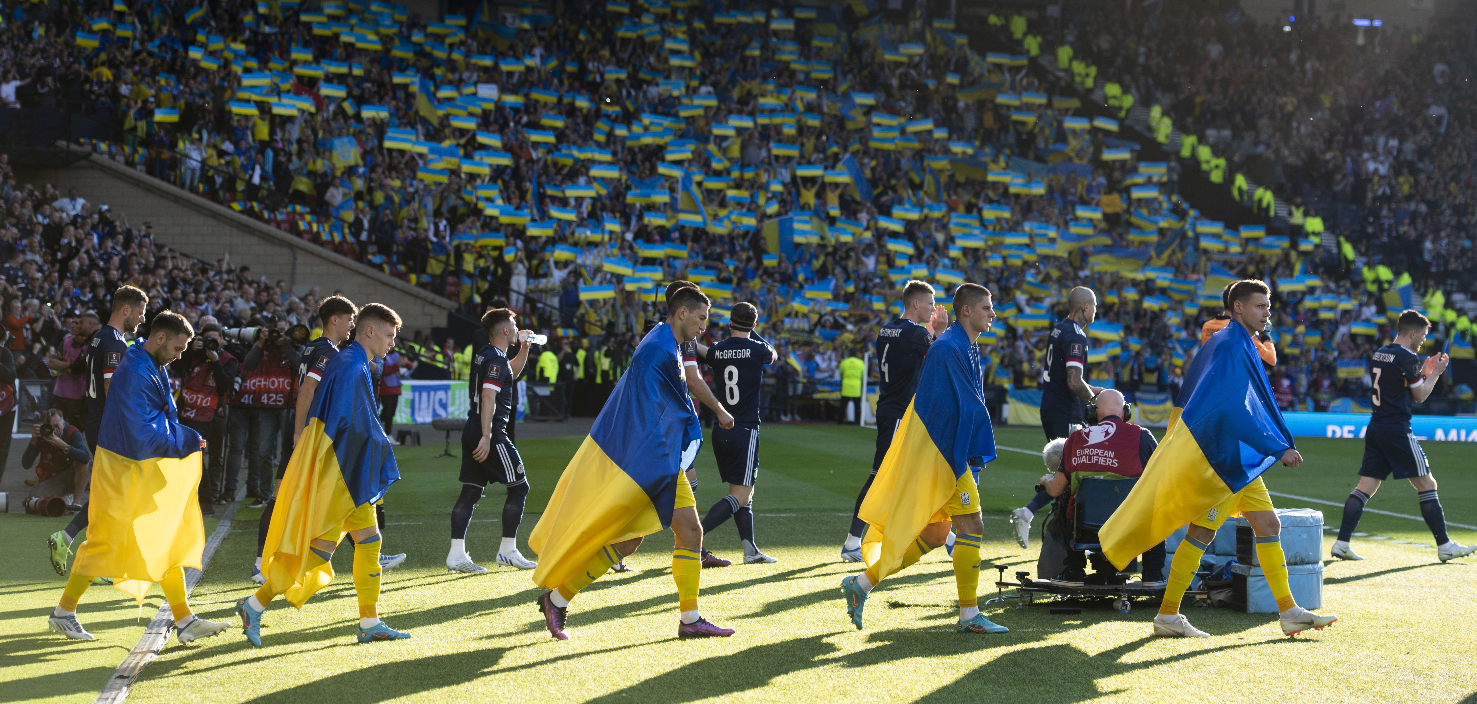Ukraine players walk out onto the Hampden pitch before the World Cup Playoff Semi Final. (Photo by Craig Foy / SNS)