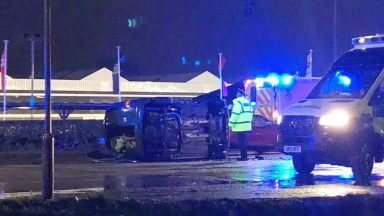 Car flips onto side in two-vehicle rush hour crash on Aberdeen’s Wellington Road