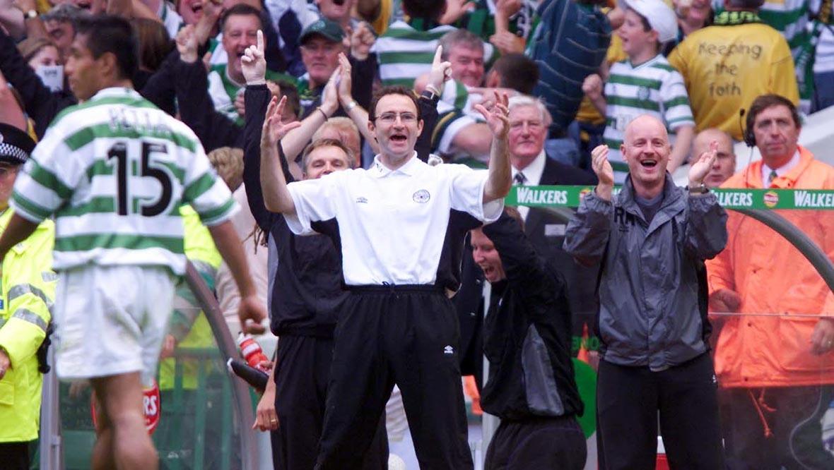 O'Neill celebrating after Celtic hit Rangers for six in 2000.