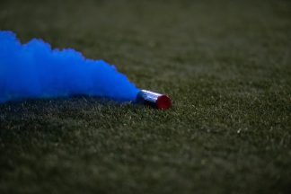 Melbourne derby abandoned as goalkeeper hit by metal bucket in ‘shocking scenes’