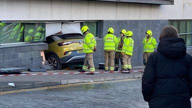 Car crashes and ploughs into side of University of Dundee Dalhousie building