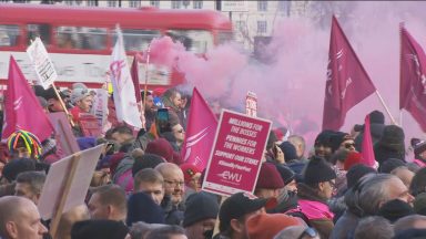 Royal Mail postal workers walk out on strike across the UK