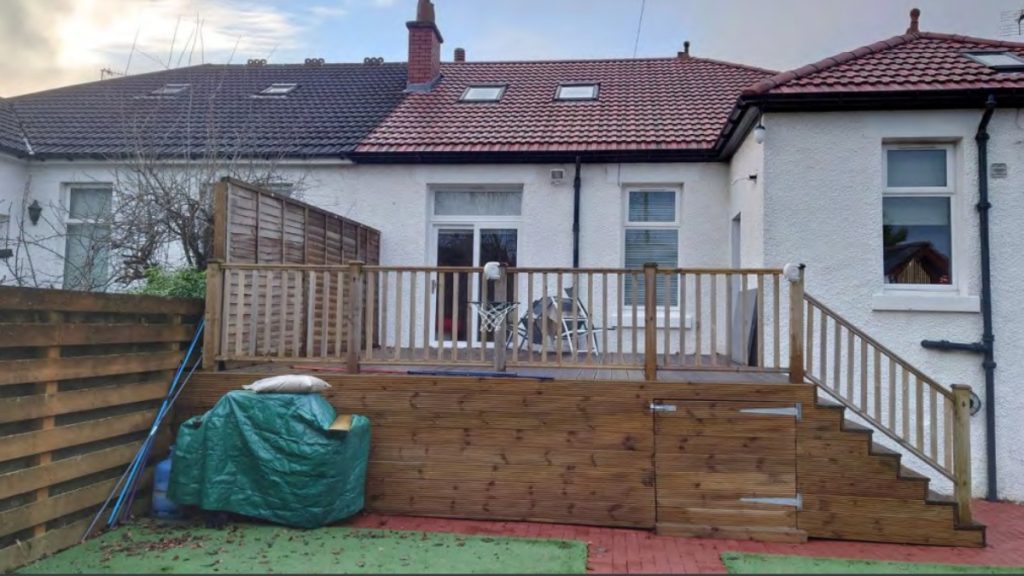 Glasgow neighbours ordered to tear apart decking for second time over