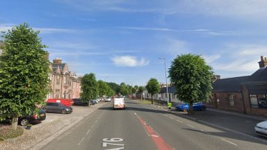 Pensioner hospitalised after collision with car and traffic island in Thornhill