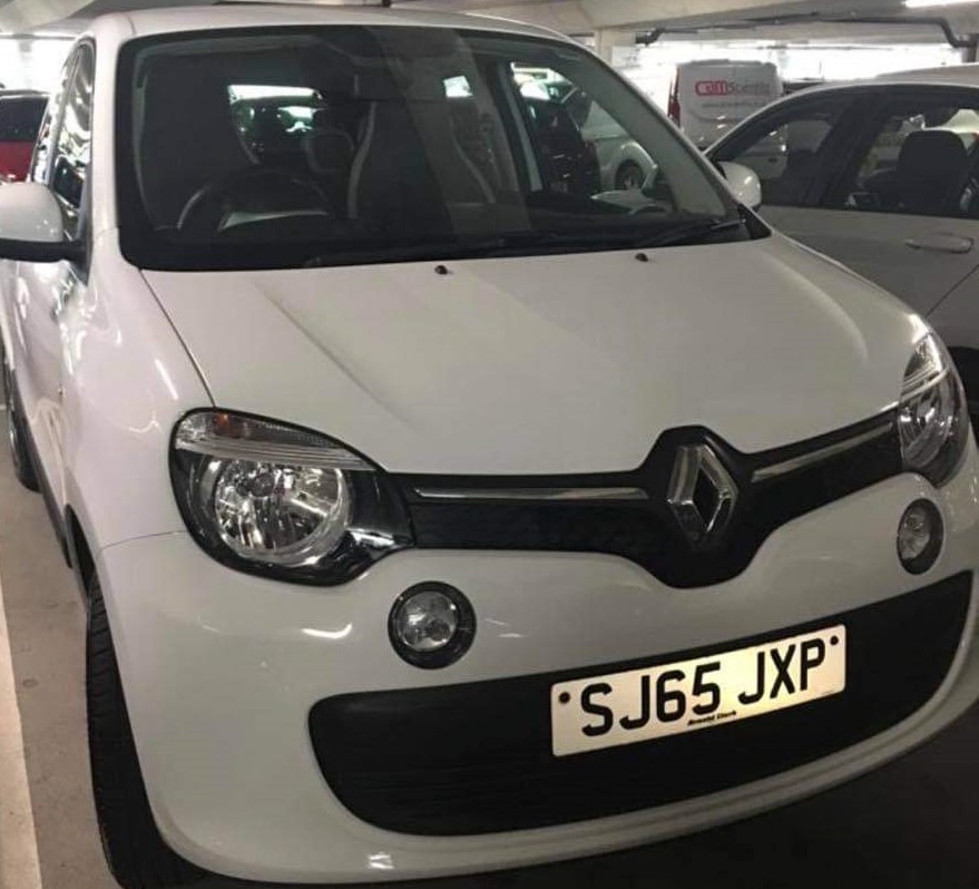 She has access to a 'distinctive' white Renault Twingo car, with a black stripe along the side skirts on both sides.