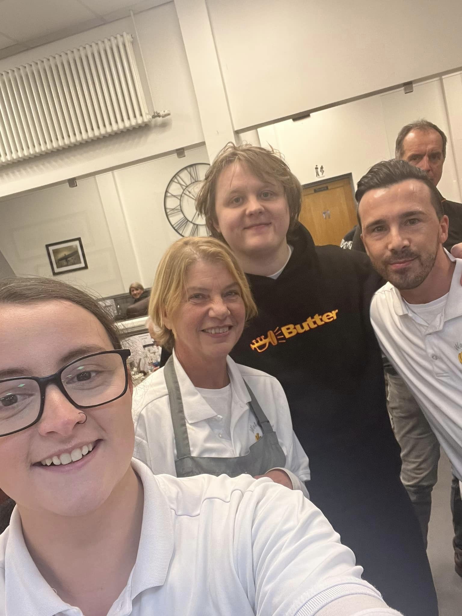 Staff at The Waterfront fish and chip shop in North Shields pose for photo with Lewis Capaldi.