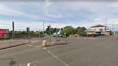 Man and woman taken to hospital in Glasgow after being struck by vehicle in Giffnock