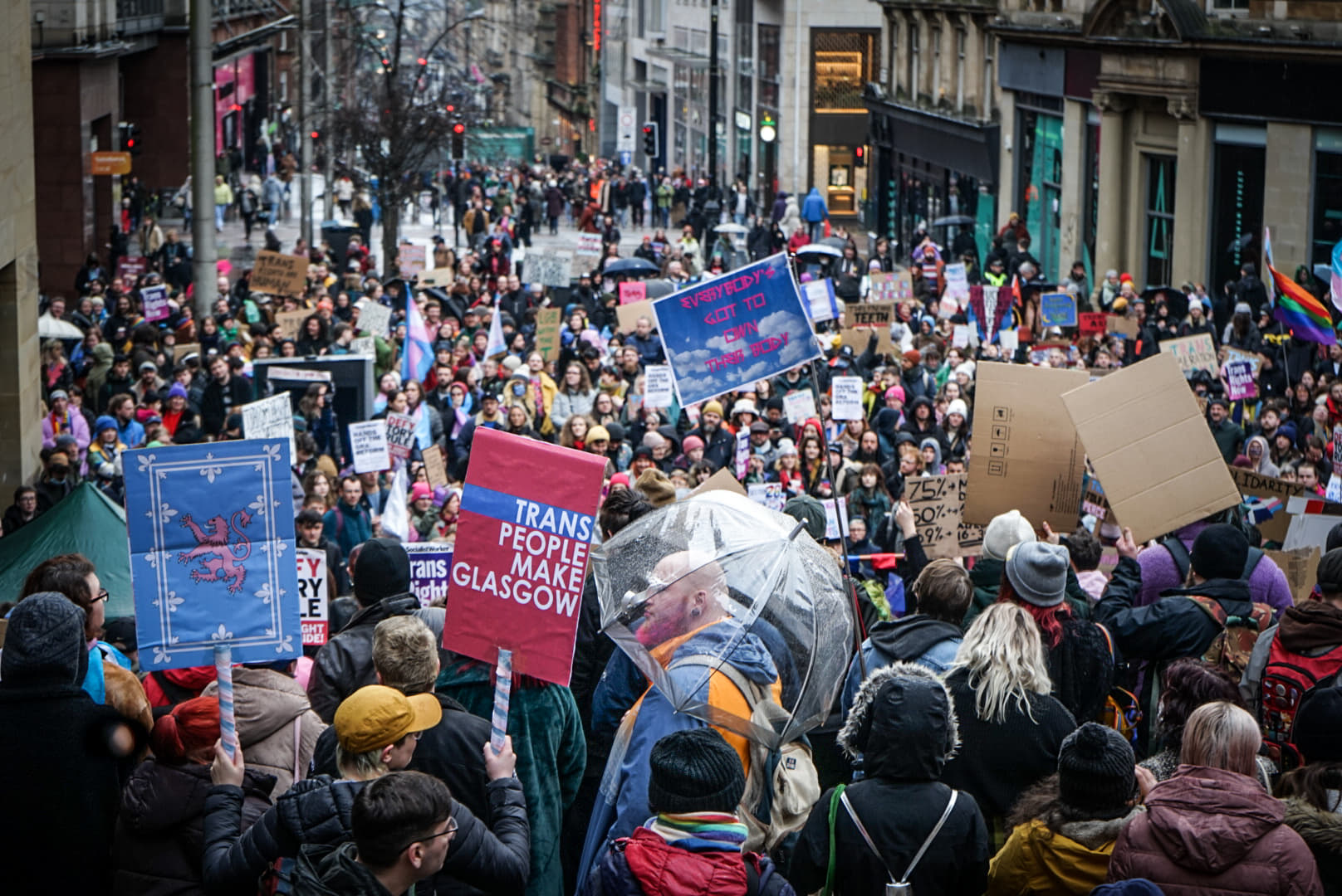 Activists and politicians spoke at the rally in Glasgow's city centre while those in the crowd held placards with slogans including 