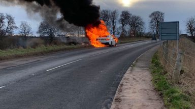Couple rescued by family after BMW burst into flames on A937, near Marykirk Bridge