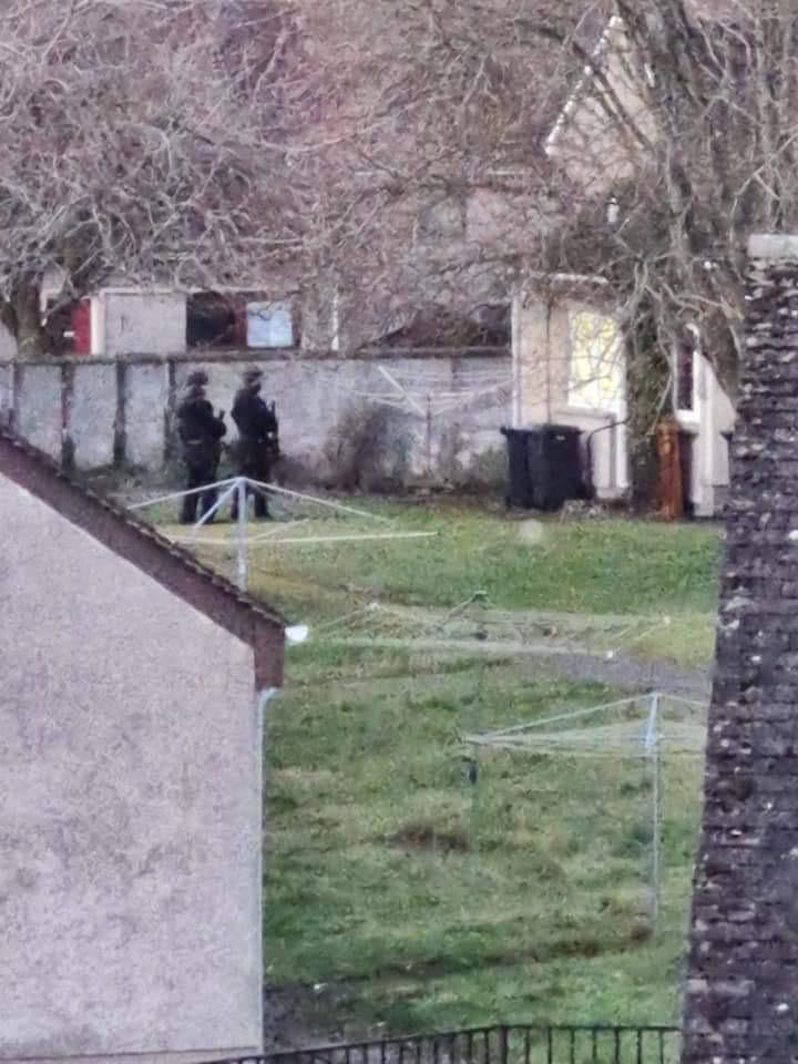 Armed police were spotted at the property. 