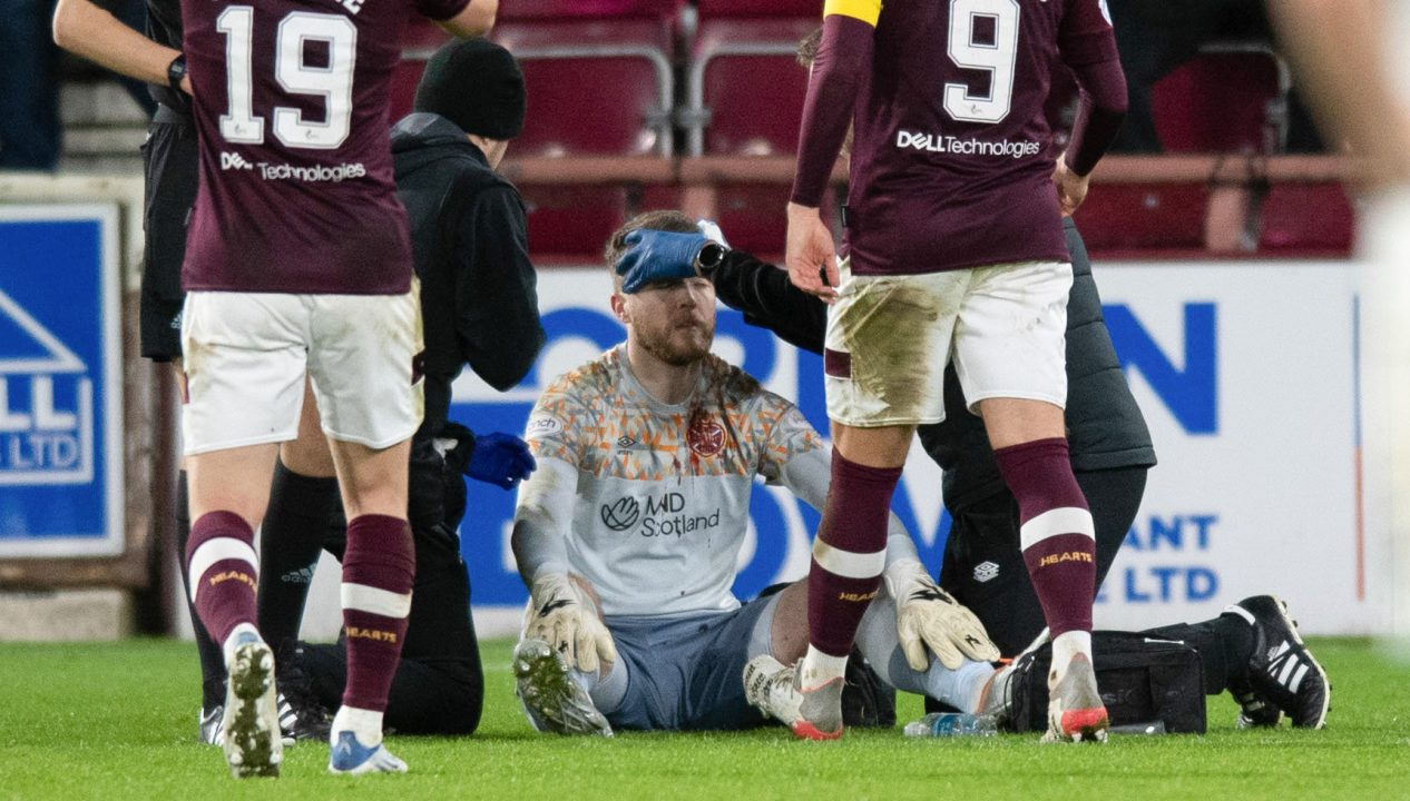 Teenager arrested after Hearts goalkeeper struck by ‘objects’ during Edinburgh Derby
