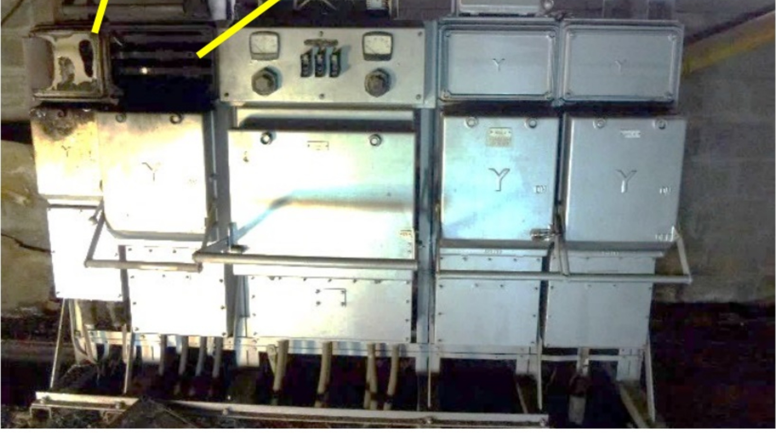 The switchpanel with a damaged area to the top left and panel cover removed.