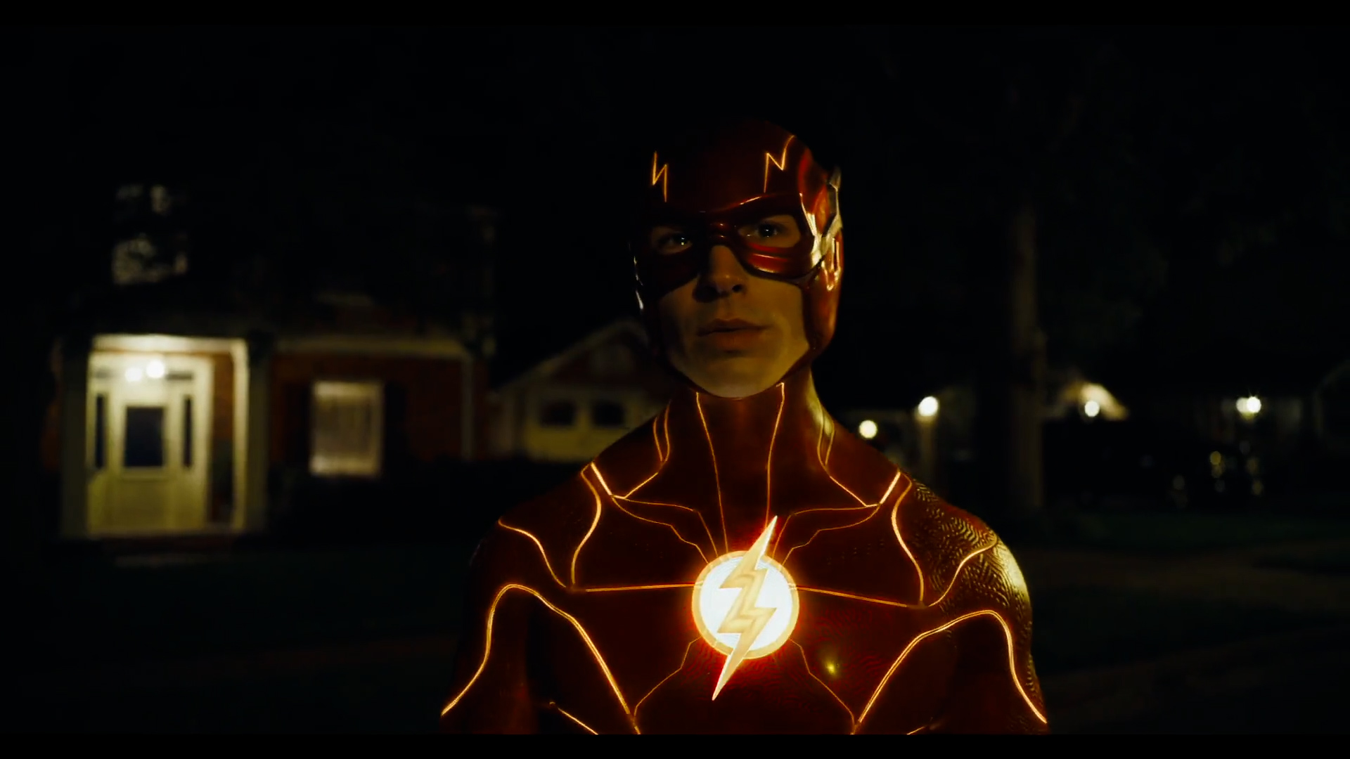 The Flash, played by Ezra Miller, teams up with two Batmans in the Super Bowl trailer.