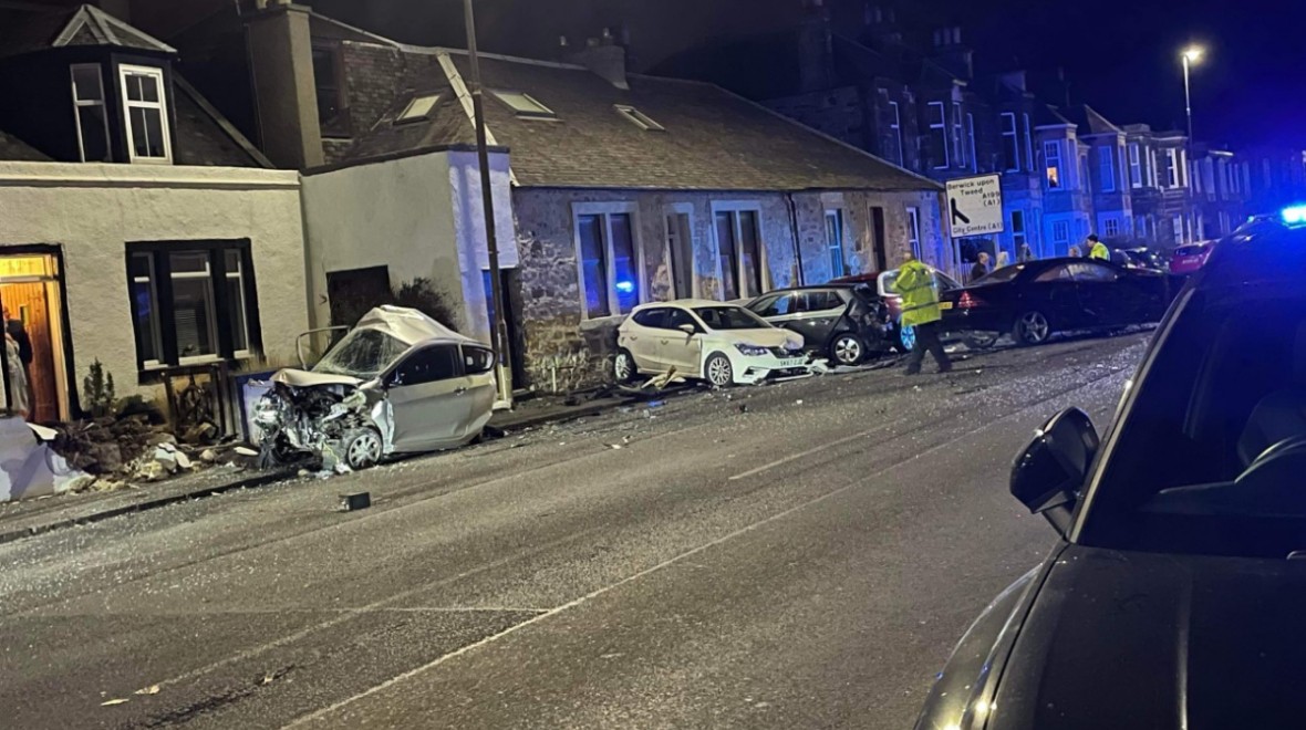 Driver flees scene of crash in Edinburgh after smashing into four parked cars and garden wall