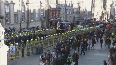 Crowds gather at Royal Mile in Edinburgh for funeral of firefighter Barry Martin who died after Jenners blaze