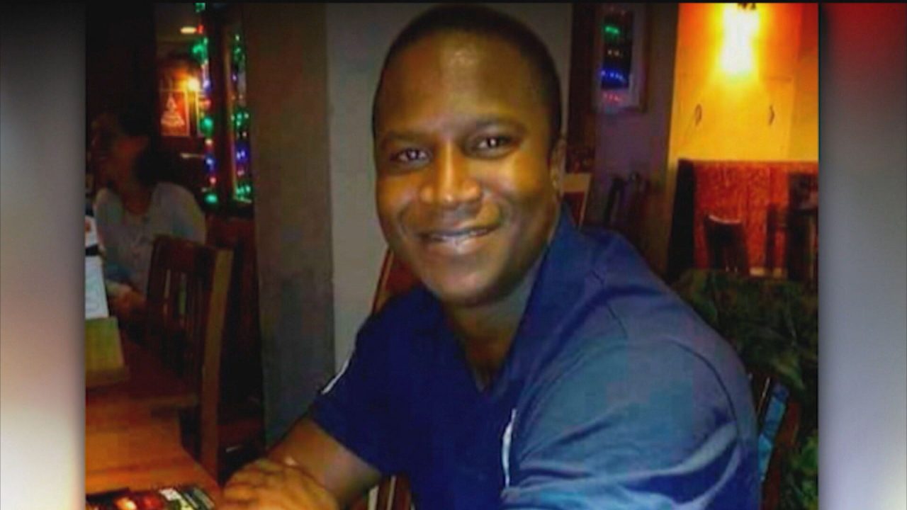 Image of Sheku Bayoh wearing a blue top and smiling at the camera