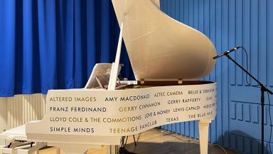 Don’t you forget about key: New piano for Holyrood Secondary in Glasgow thanks to Simple Minds