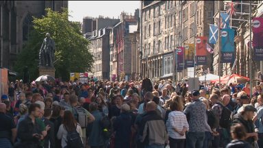 Crowds are seen on the Royal Mile during the Edinburgh Fringe